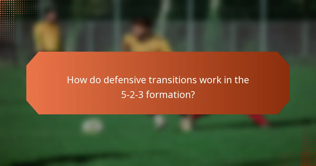 How do defensive transitions work in the 5-2-3 formation?