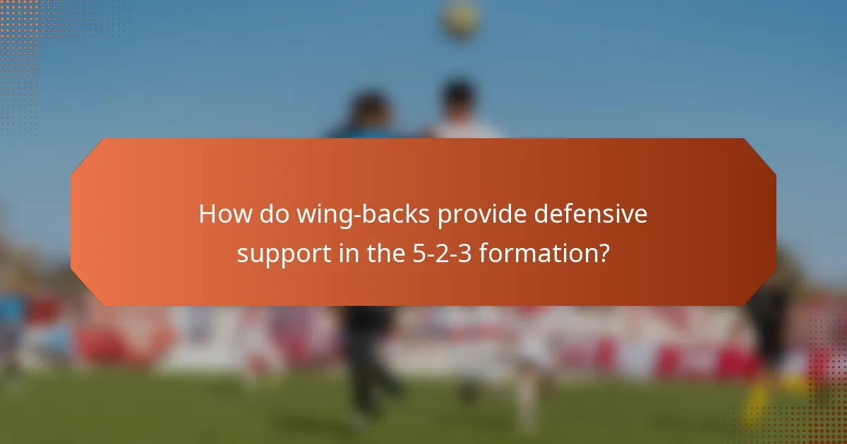 How do wing-backs provide defensive support in the 5-2-3 formation?