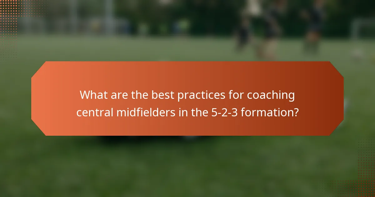 What are the best practices for coaching central midfielders in the 5-2-3 formation?