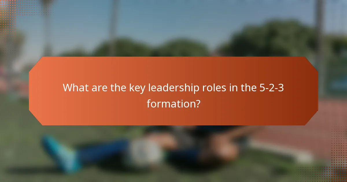 What are the key leadership roles in the 5-2-3 formation?